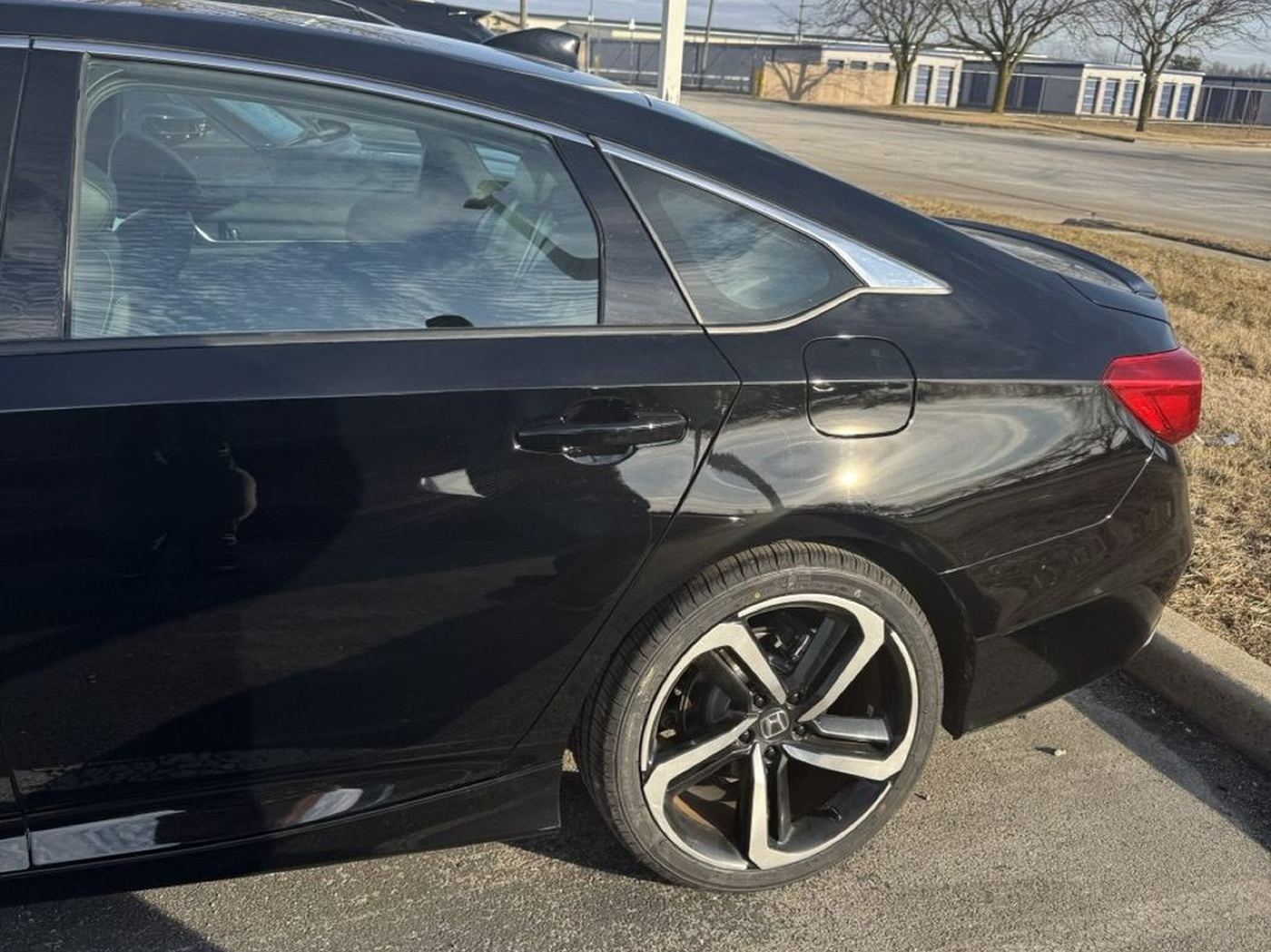 Honda Accord fully restored with flawless paint match and OEM-quality finish on driver-side rear quarter panel after collision repair at Bob Rohrman Collision Repair Center in Lafayette, Indiana