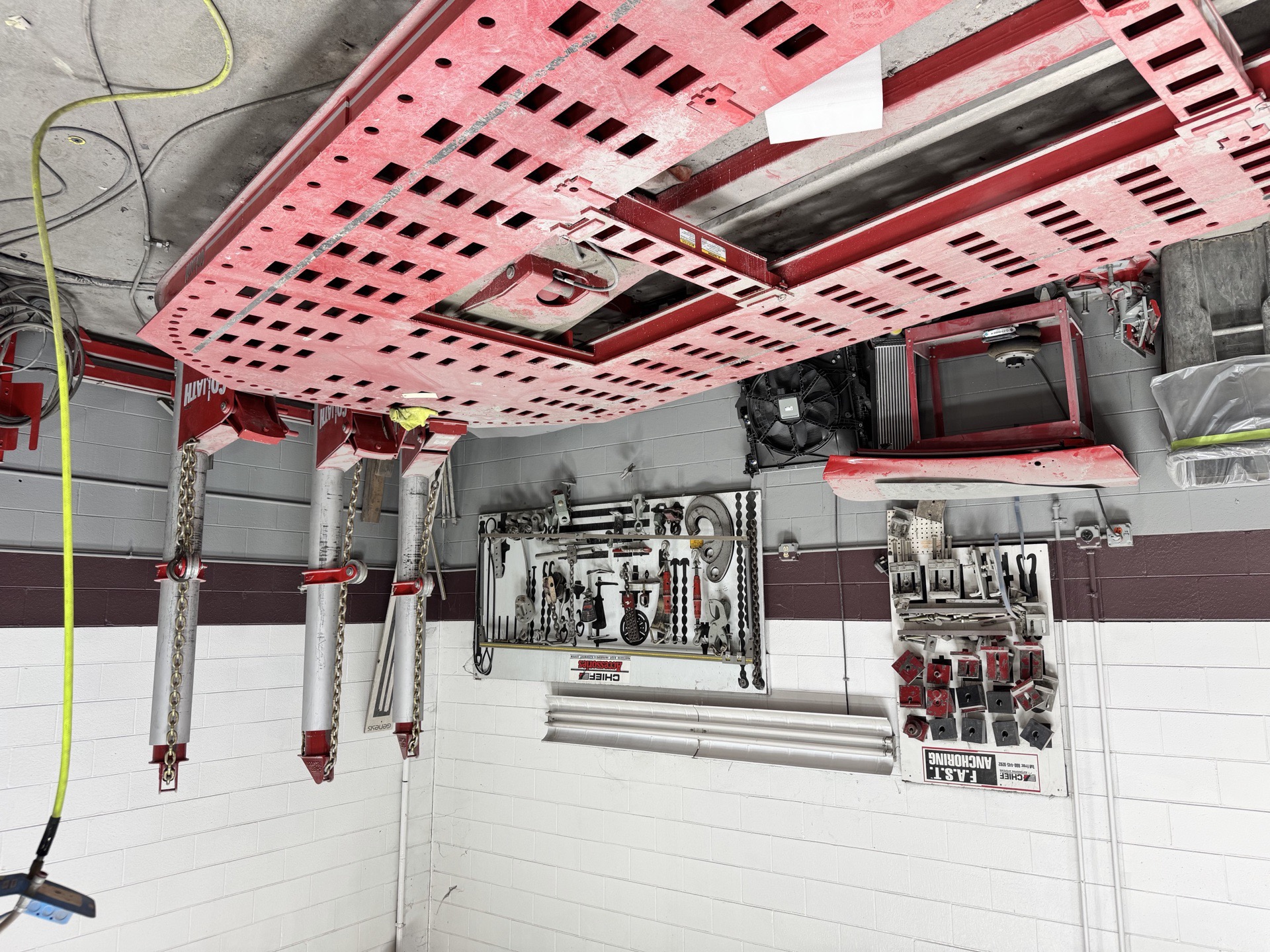 Computerized frame measurement rack at Bob Rohrman Collision, used for precision unibody structural repair in Lafayette IN